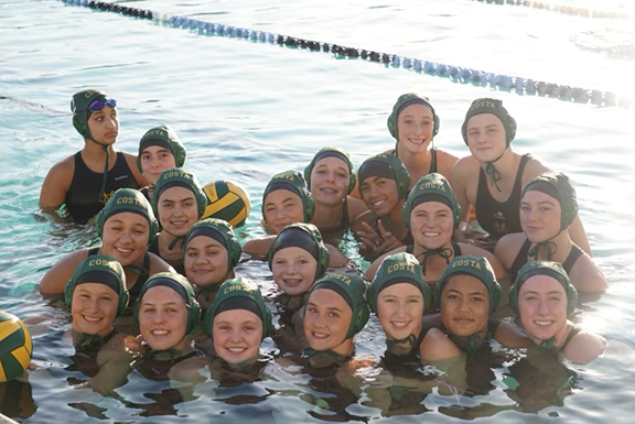 Mira Costa Girls Water Polo athletes gathered in the pool